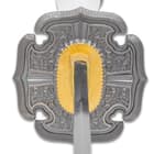 It has a forged 28 1/2” 1045 high carbon steel blade, extending from a brass habaki and pewter-colored metal alloy tsuba