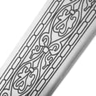 Closeup view of the intricate etchings on Excalibur’s blade. 