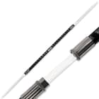 Black and silver metal twin ninja sword set locked together while showing slight peeking of stainless steel blade
