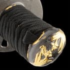 Each sword has a full-tang, carbon steel blade and black cord and faux rayskin wrapped handles with cast metal tsubas
