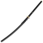 The hand-lacquered, black wooden scabbard protects the blade while adding classic style to this 60” overall katana