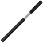 Stainless steel blade with a titanium finish slightly ejected from the black steel tube casing
