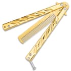 It looks and feels just like a real butterfly knife but has an actual comb instead of a sharpened blade, for safely training