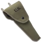 The full-size pistol holster is made of durable olive drab canvas with a stamped US, and has a closed bottom design