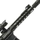The top Picatinny rail sits flush with the upper receiver and is compatible with left or right-handed mil-spec upper receivers