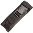 The knife can be housed in its black nylon sheath with buckle closure.