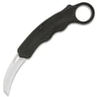 The knife has a 2 3/4” D2 tool steel, hawkbill blade that shoots in and out, following the curvature of the handle