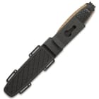 The 9 1/4” overall combat ready knife snaps securely into its TPU belt sheath, which also features lashing holes