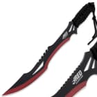 The razor-sharp, upswept fantasy blades have 11” edges and feature modified saw teeth and cut-outs on the spines