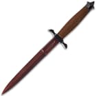 The 12 1/4” overall fixed blade knife can be carried in its genuine leather belt sheath, which has a snap strap closure