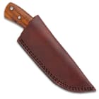 The knife can be stored in a leather belt sheath