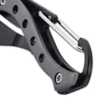 The metallic grey handle is made of a lightweight cast aluminum and sturdy TPU and features a carabiner-style clip