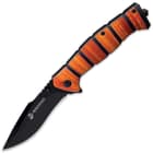 It has a 3 1/2” razor-sharp stainless steel blade with a black, non-reflective finish, which can be deployed with thumbstuds