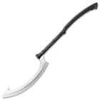 Full view of honshu egyptian sickle shaped sword with a stainless steel blade extended from a edm textured black handle
