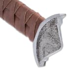 The handle has a genuine leather wrapping to provide a comfortable, slip-free grip and the pommel has a traditional Viking design
