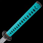 The hardwood handle is faux ray skin wrapped with teal blue cord.
