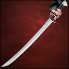 Sword in black braided sheath with an inch of carbon steel blade showing
