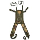 The harness is fully adjustable with nylon webbing straps and padded shoulder straps and the belt is thick nylon webbing