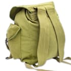It has a large, main compartment with a drawstring top and a flap that’s secured with nylon webbing straps and metal buckles