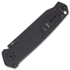 Closed benchmade mediator automatic pocket knife with a matte black finish and deep pocket clip.

