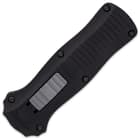 Closed black benchmade infidel OTF pocket knife with satin grey sliding trigger and decorative handle grooves.
