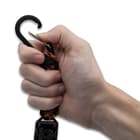 Opening the carabiner clip on the lanyard