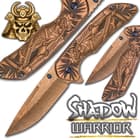 Detailed views of the ornate gold colored knife with intricate handle design and ornate blade.