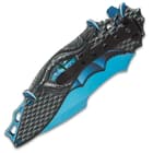 The aluminum handle scales have been 3-D printed with black dragon scales and a striking, bright blue dragon’s eye