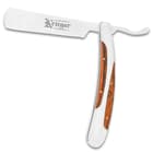 The handsome razor has an extended tang stainless steel blade with mirror finish and a 2 3/4” keenly sharp edge