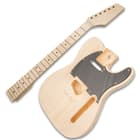 The body is made of basswood with complete shaping and routing and the neck is a solid, select maple wood with a 25 1/2” scale length