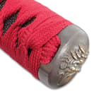 The pommel has an ornate dragon design. 