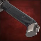 Honshu 1060 carbon steel blade peeking through black scabbard wrapped with black faux leather cord
