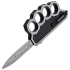It has a 3 1/2” stainless steel, spear point blade and a chrome finished, metal alloy knuckle handle with a carbon fiber inlay pattern