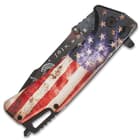 Closed pocket knife with a distressed American flag handle and "Join, or die" inscription of the blade along with black accents. 
