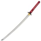 The katana has a 29”, heat-tempered, 1045 carbon steel blade, which has been hand-sharpened with a Japanese whetstone