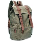 The rucksack has a travel tough, green canvas construction with a soft, protective lining on the inside and is approximately 15”x 17”