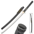 Shinwa Death Dealer katana sword has 1045 carbon steel blade by scabbard with black and yellow cord-wrap and metal pommel

