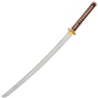 The katana has a full-tang, hand-forged, 29” 1060 carbon steel blade, which extends from a polished brass habaki