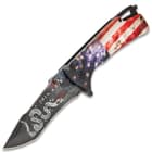 Pocket knife with American flag handle and non-reflective american flag blade with the inscription "Join, or die" and a historical political image.
