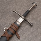 Each of the swords has a 17” stainless steel blade and a cast metal handle with an ornate guard and pommel