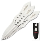 Three 3 3/4" stainless steel "Gil Hibben" double-edged throwing knives. Bottom right corner knives enclosed in sheath.
