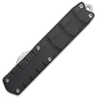 The knife has a grippy handle made of 6061 T6 aluminum and has double-action deployment with a side loaded thumb slide.