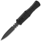 Angled image of the Claymore Serrated OTF Knife open.