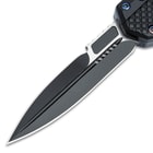 Detailed view of the dagger style stainless steel blade with black coating.