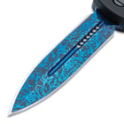 Close up image of the Damascus Automatic OTF Knife blade.