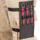 The nine throwing knives can be housed in a nylon sheath with elastic straps.