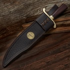 The Gil Hibben Bowie in its leather sheath