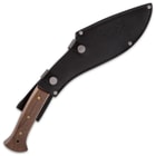 The 15” overall kukri can be carried comfortably at your side in its genuine leather belt sheath, which has a snap strap