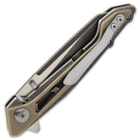 The lightweight, skeleton handle is of stainless steel with tan, G10 scales and it has a metallic blue pocket clip