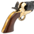 The .44 caliber, black powder pistol has a solid brass frame with a 7 1/2” blued barrel and a wooden grip